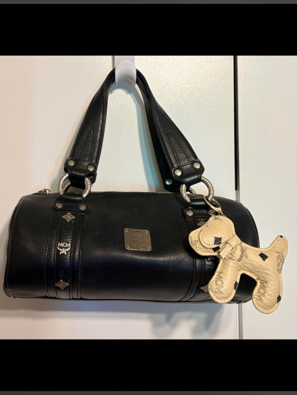 Authentic MCM Black Leather Studded Barrel  Bag & Authentic MCM dog charm & COA